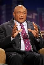 Foto de George Foreman pareja de Adrienne Calhoun