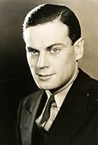 Foto de Norman Foster pareja de Claudette Colbert