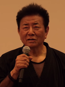 Foto de Sho Kosugi pareja de Shook Gim Chan